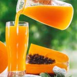 Beneficios del jugo de lechosa con naranja