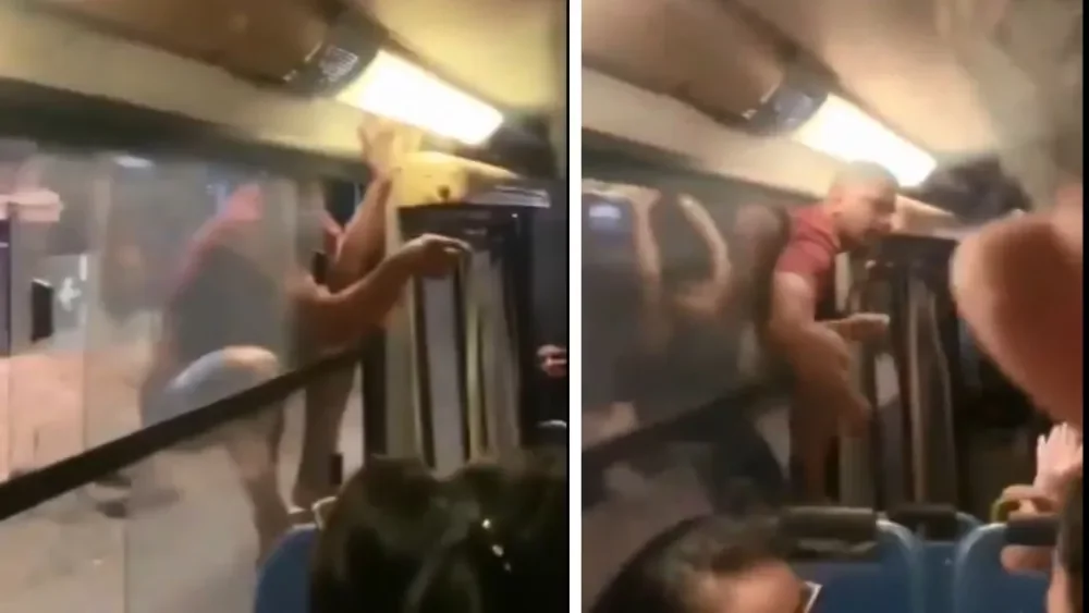 Pilló a su pareja con su amante y se subió a la ventana de un bus para reclamarle (VIDEO)