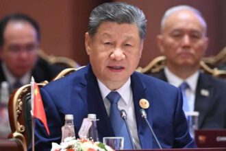 Xi